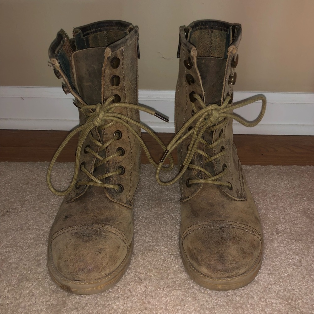 Cute distressed combat boots.